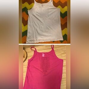 Set of 2 Women’s size large tank tops from the Gap. One white and one pink.